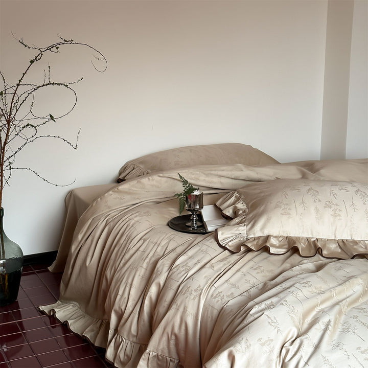 Luxurious satin bedding with floral jacquard and contrast piping