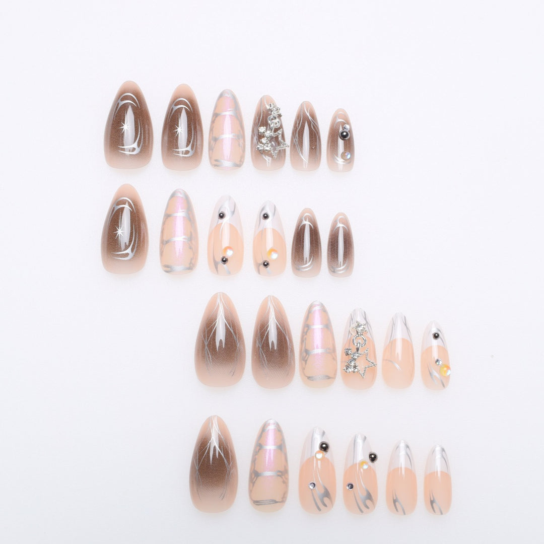Artistic Stiletto Nail Extensions with Metallic Accents Kalsten