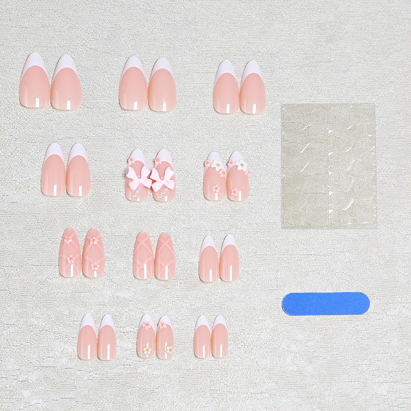 Artful Nail Tips with Ribbons and Floral Decorations Kalsten