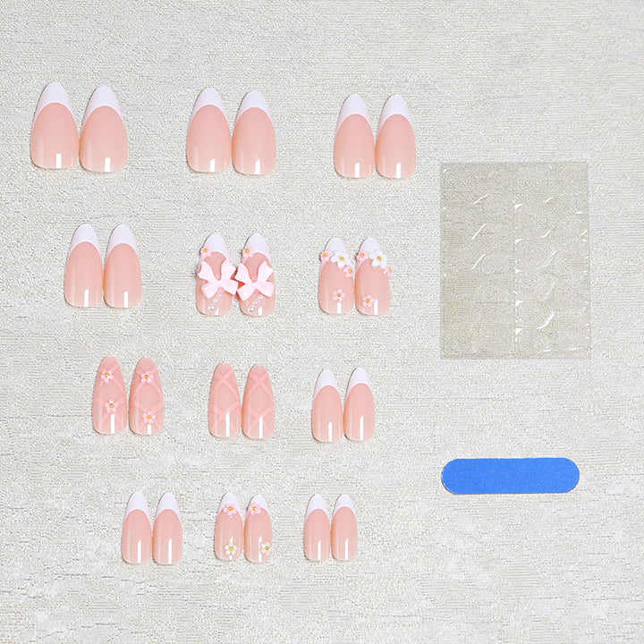 Artful Nail Tips with Ribbons and Floral Decorations Kalsten
