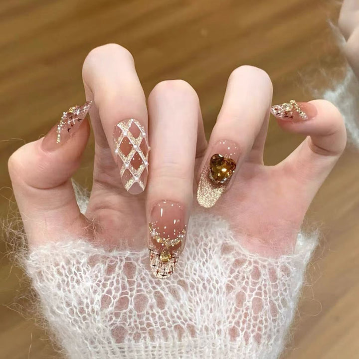 Artificial nails with glitter and heart accents Kalsten