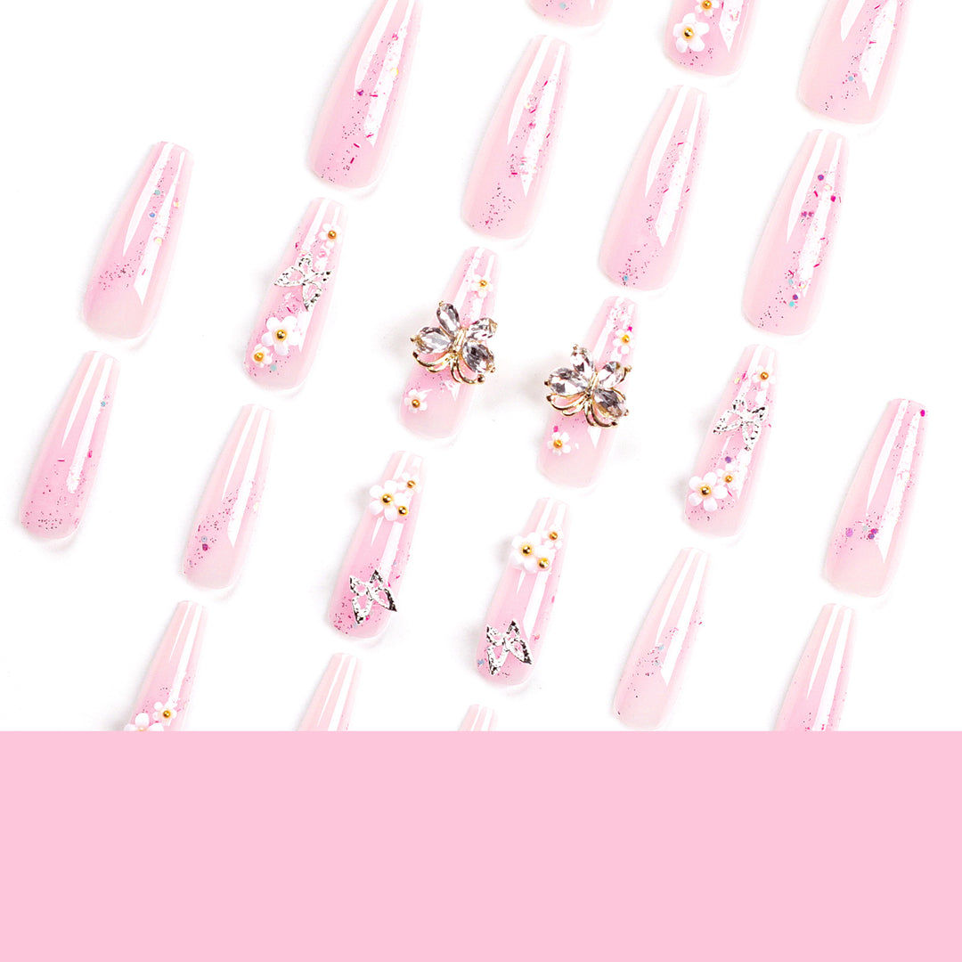 Artistic Nail Extensions with Glitter and Floral Accents Kalsten