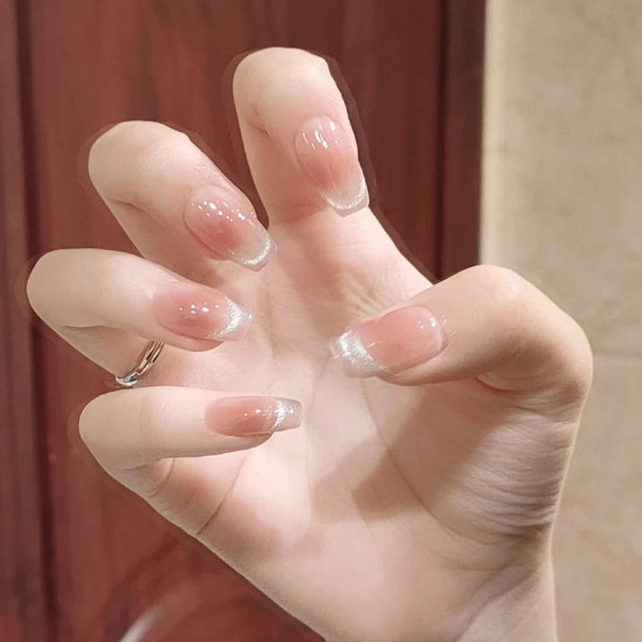 Nail set with elegant French design and sparkling accents Kalsten