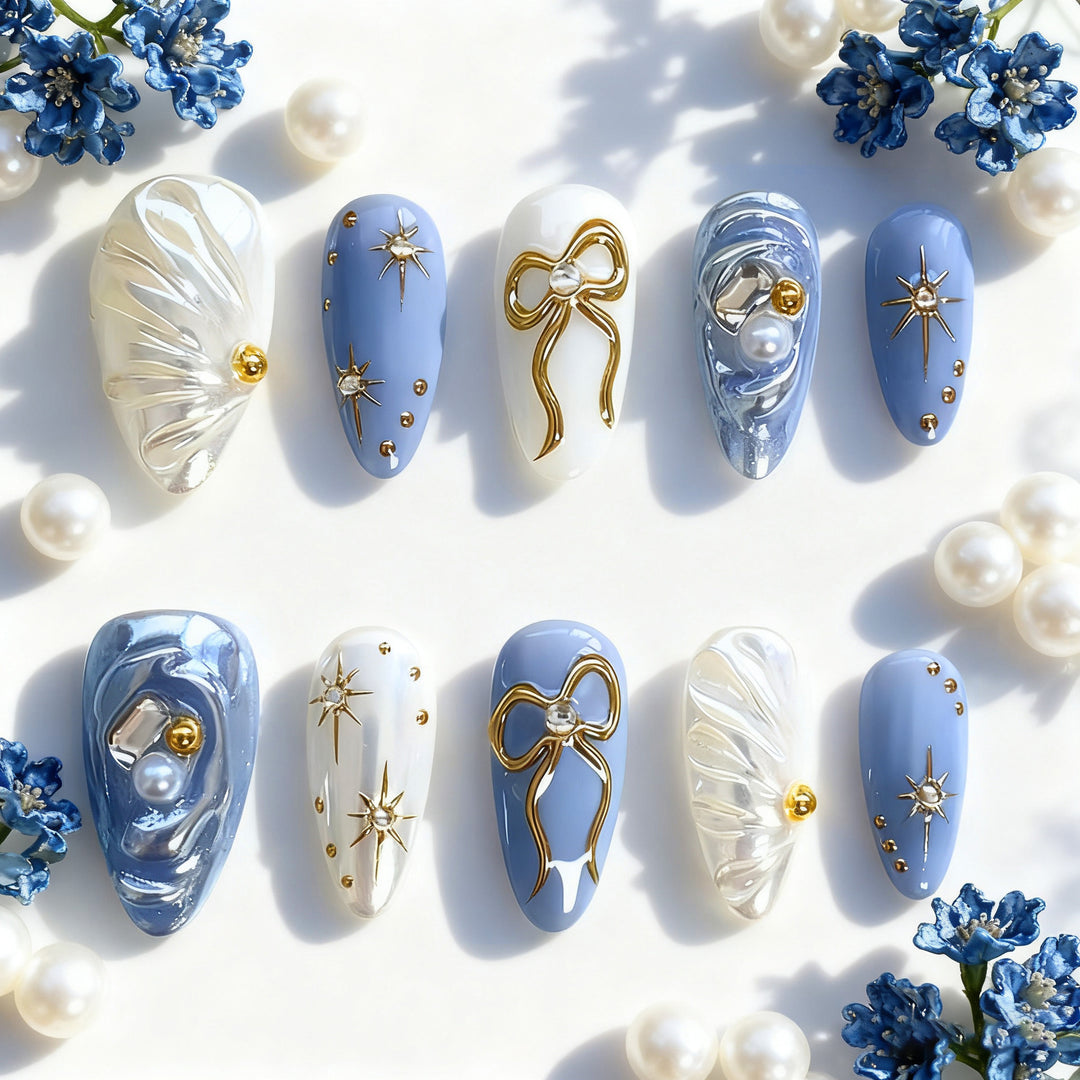 Acrylic nail set with glamorous golden accents Kalsten