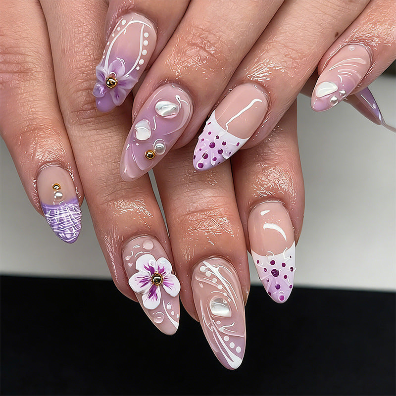 Artificial nail set with exotic floral and glitter accents Kalsten