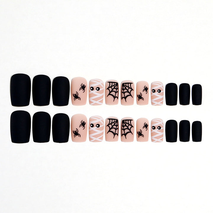 Artificial nail set with creepy Halloween motif and delicate spider designs Kalsten