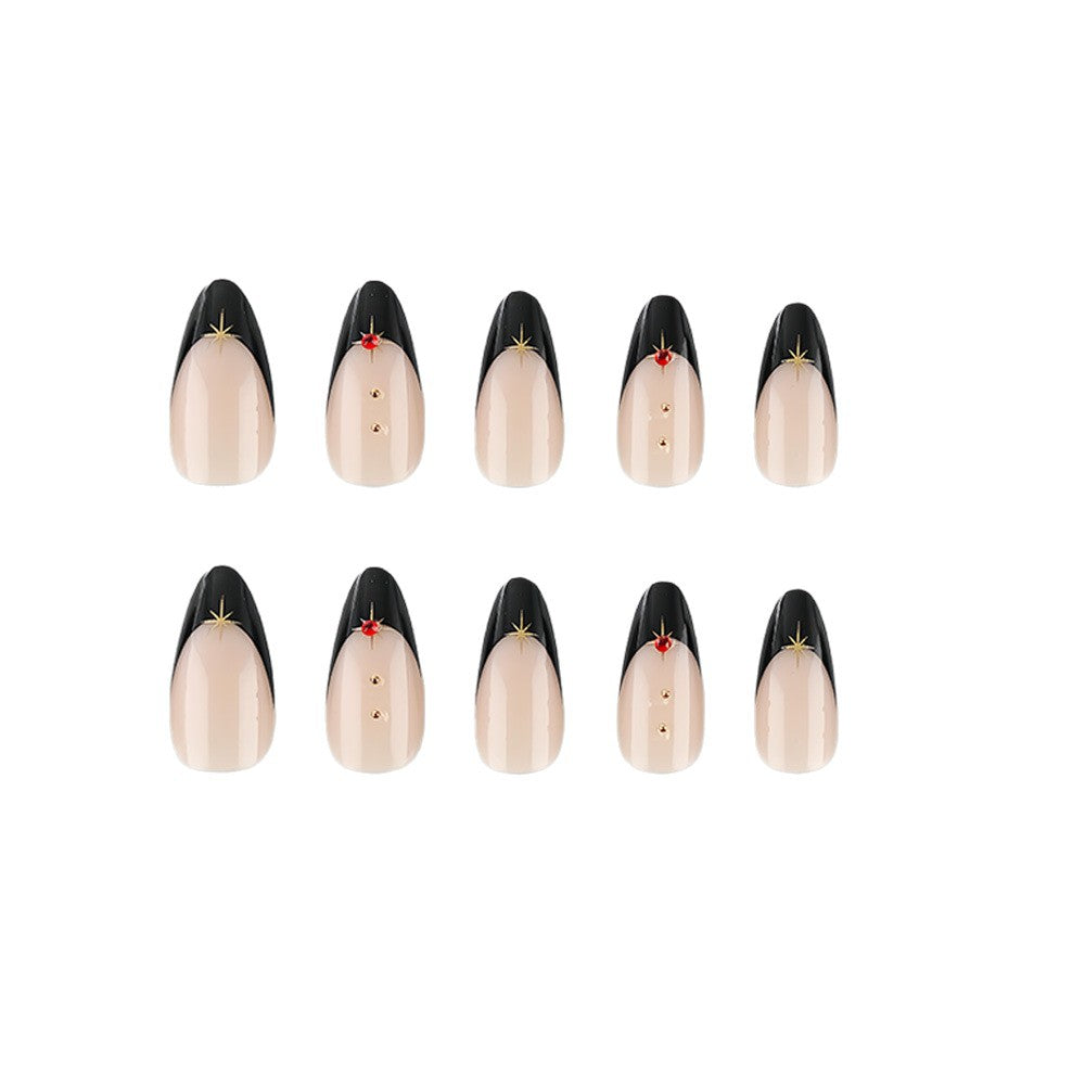 Glamorous artificial nails in stylish stiletto design with golden accents Kalsten