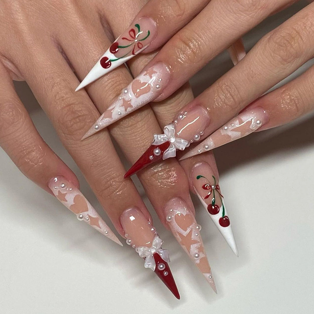 Artificial Nail Art with Festive Designs Kalsten