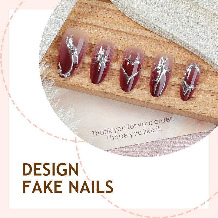 Artificial nail set with elegant glitter accents and floral details Kalsten