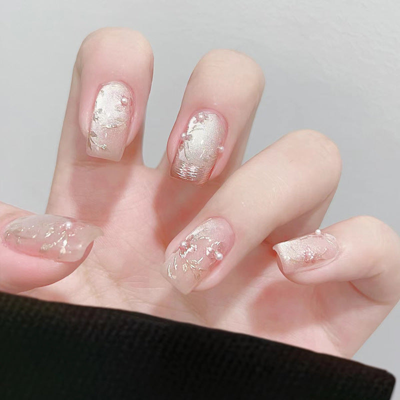 Artistic Press-On Nail Set with Elegant Floral and Pearl Accents Kalsten