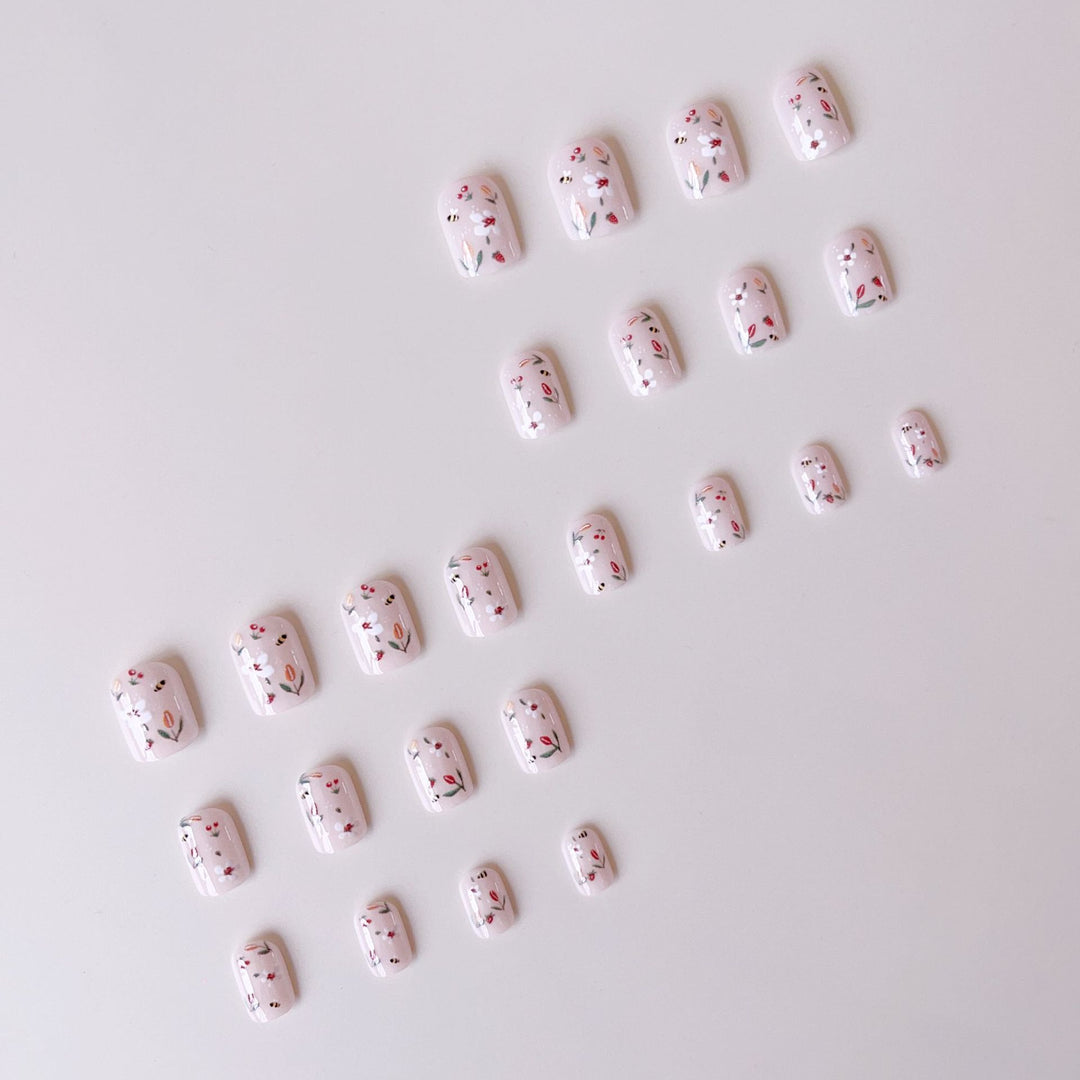 Artificial nail set with cheerful flower and bee designs Kalsten