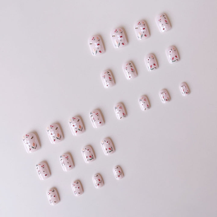 Artificial nail set with cheerful flower and bee designs Kalsten