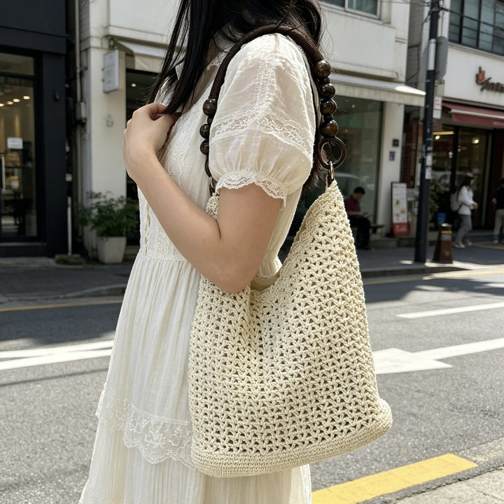 Hand-knotted bucket bag with wooden handles Kalsten