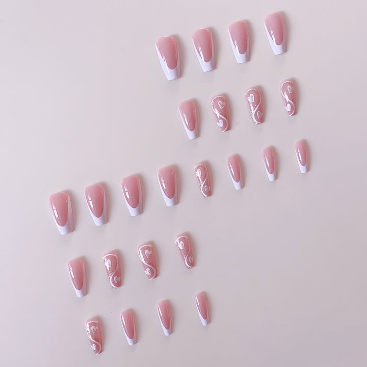 Artificial nail set with elegant heart decorations and glitter accents Kalsten