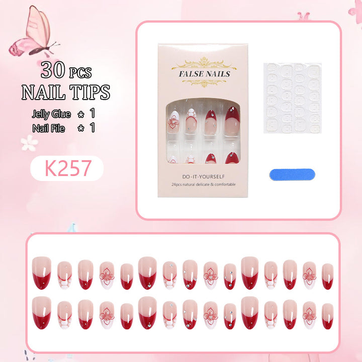 Artificial nails with floral and glittering accents Kalsten