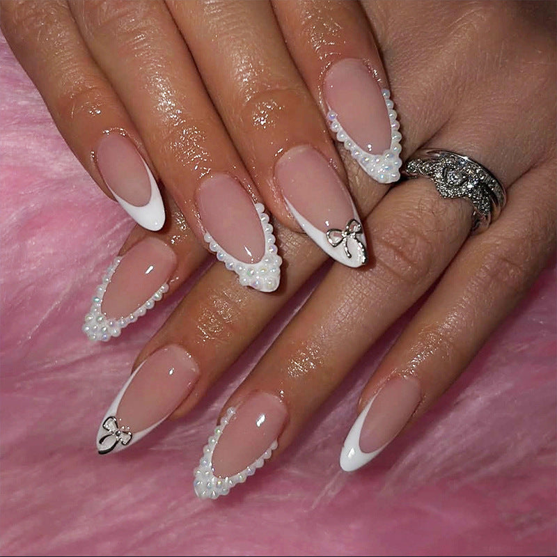 Acrylic nail set with elegant blue and nude color accents Kalsten