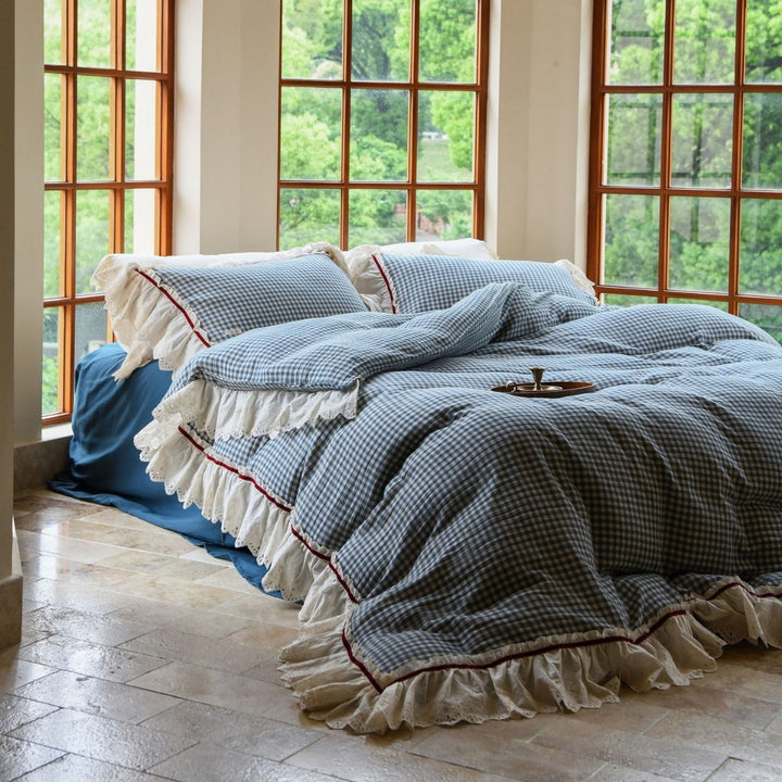 Luxurious bed linen set made of cotton gauze with quilted blanket and lace trim