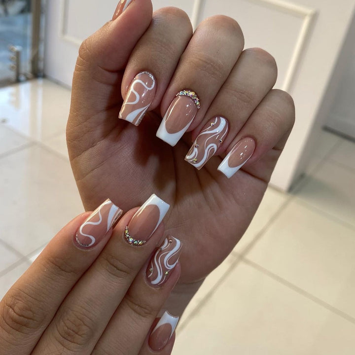 Artificial nail set with elegant French design and creative accents Kalsten