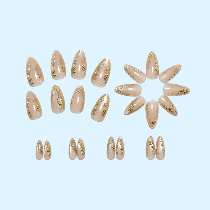 Glamorous artificial nails with delicate gold accents Kalsten