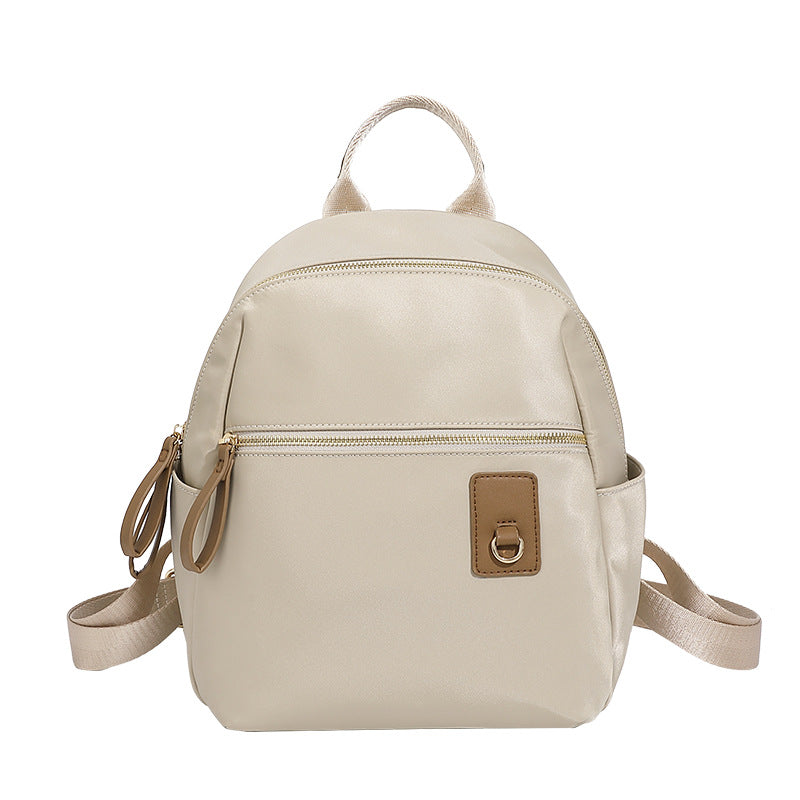 Compact Nylon Backpack with Multiple Pockets