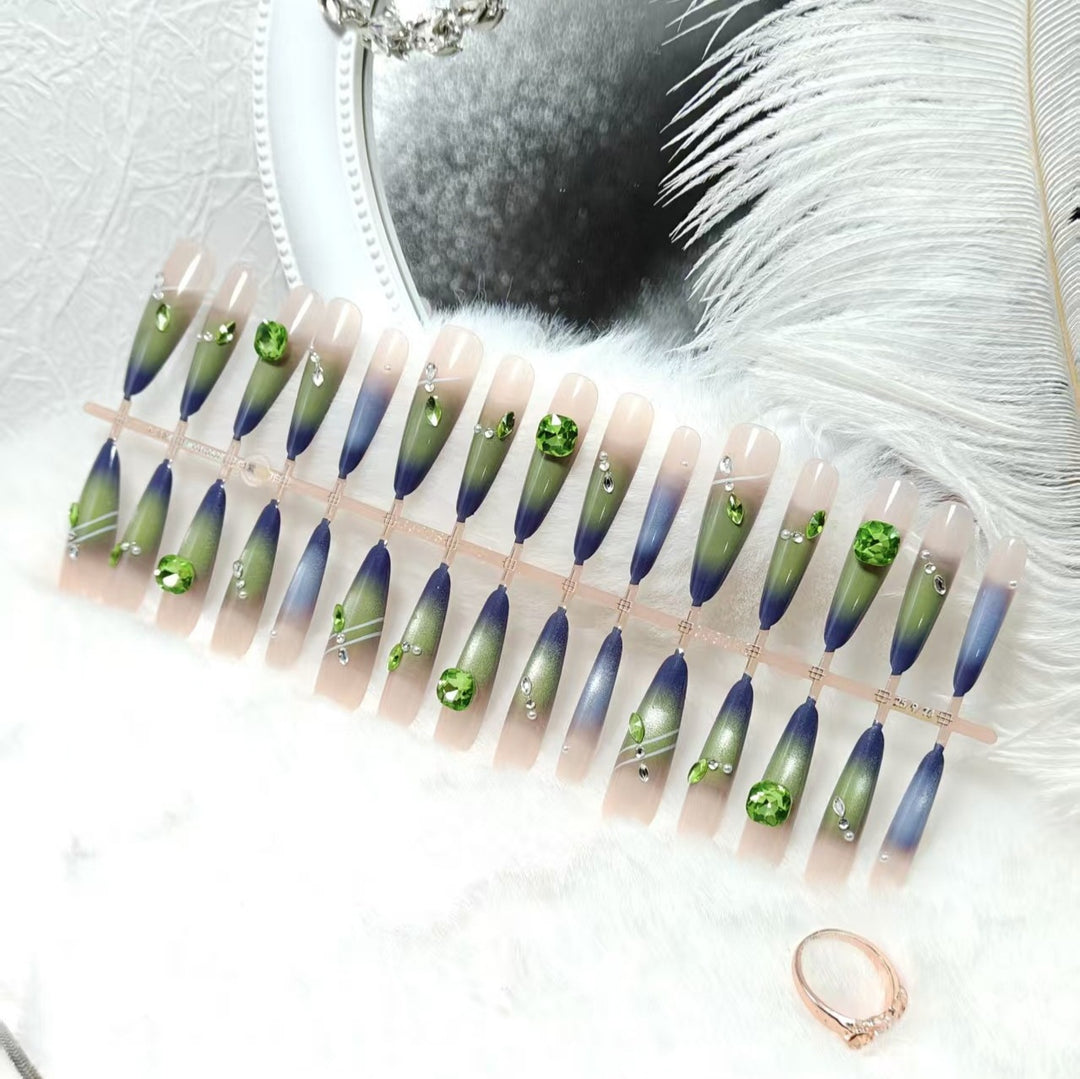 Artificial nails with elegant gradient color and glitter accents Kalsten