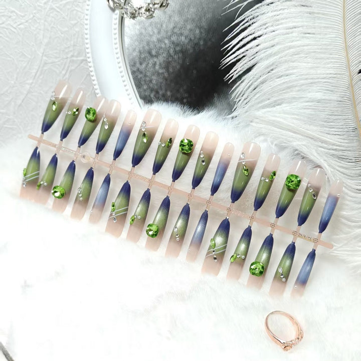Artificial nails with elegant gradient color and glitter accents Kalsten