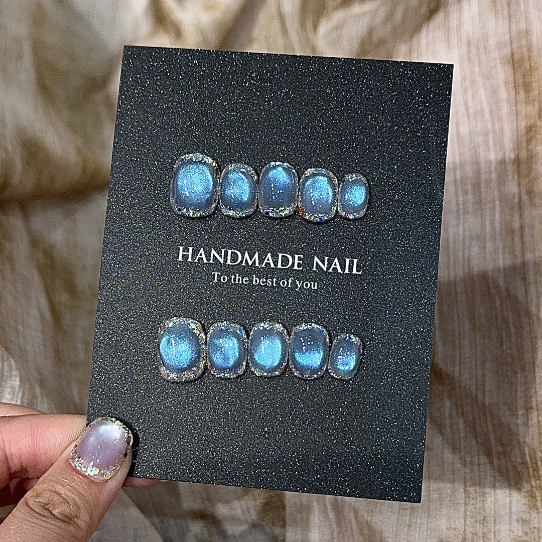 Handmade art nails with shimmering effects Kalsten