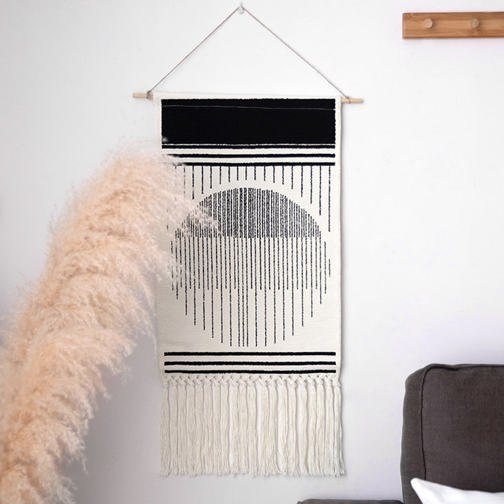Woven Boho wall tapestry in Ethno design with long fringes and wood stick Kalsten