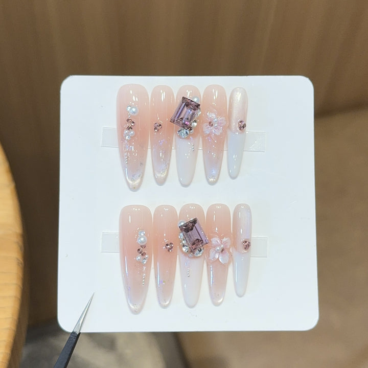 Artificial nails with elegant jewelry details Kalsten