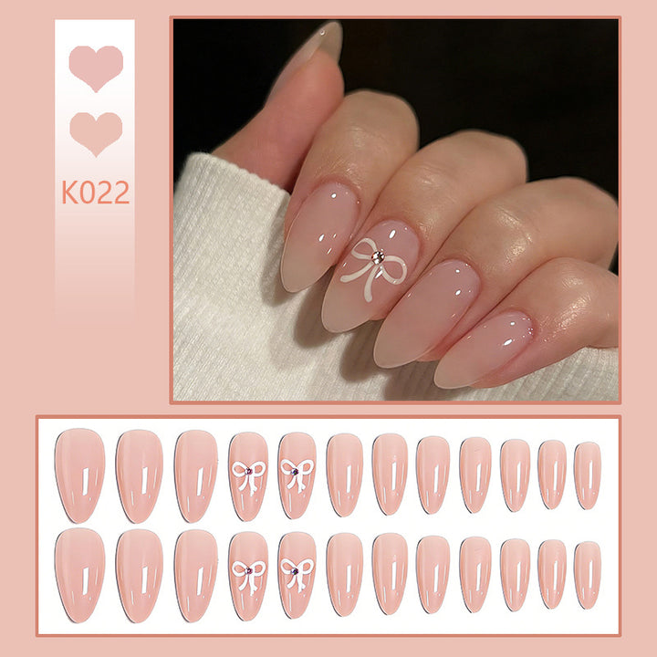 Artificia nails with delicate bow accents Kalsten