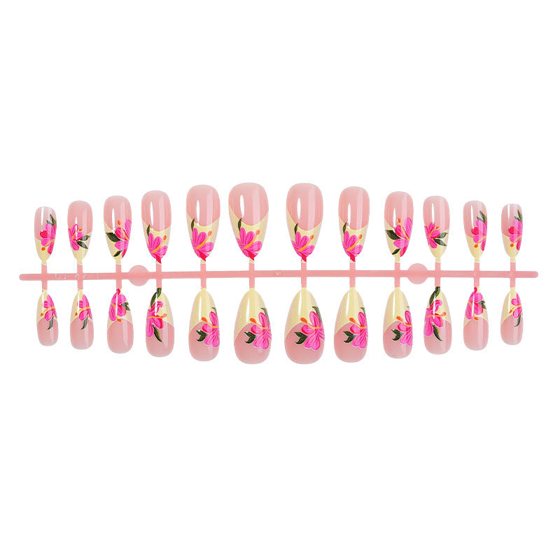 Artificial nail set with floral accents and glamorous finish Kalsten