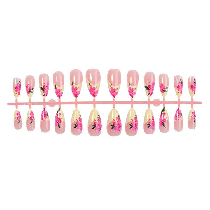 Artificial nail set with floral accents and glamorous finish Kalsten