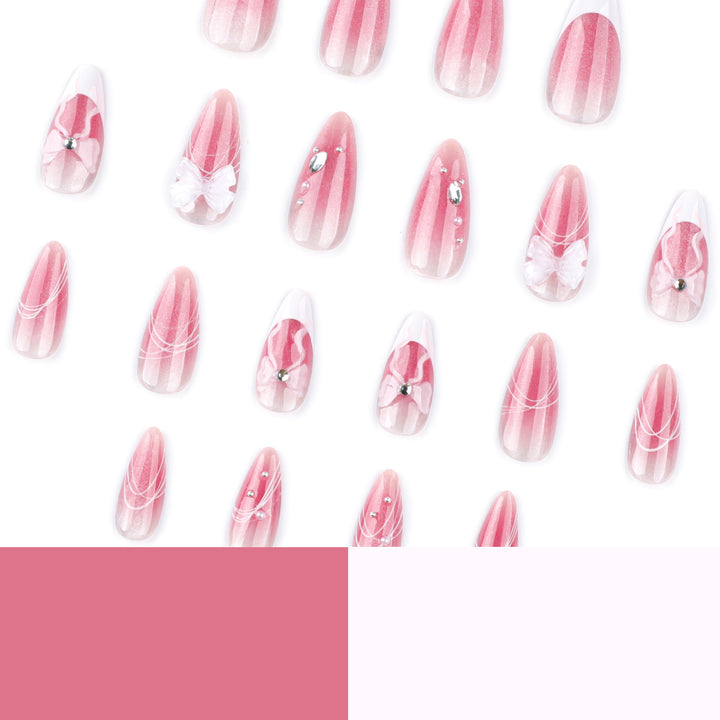 Artful acrylic nails with floral design and glitter embellishment Kalsten