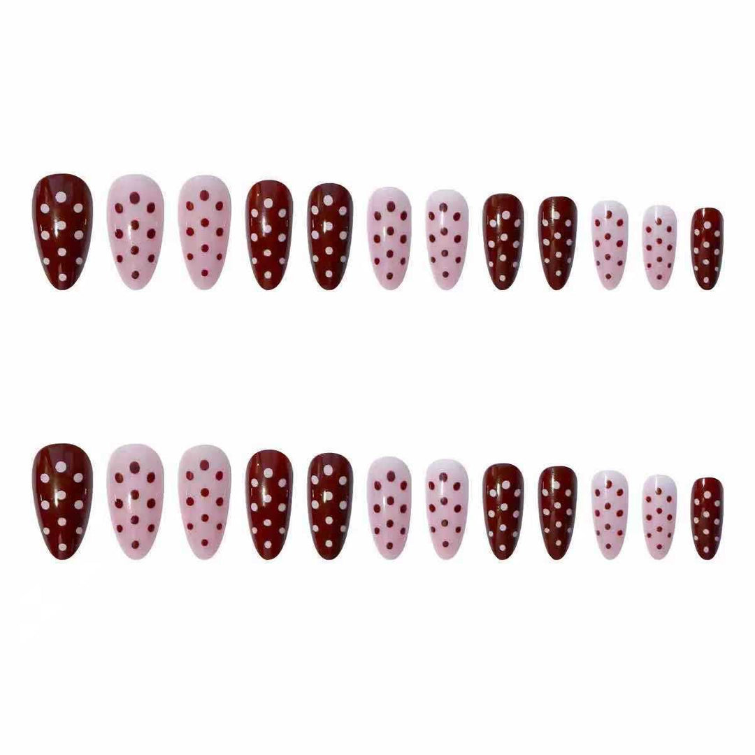 Artifical nail set with playful polka dot design and elegant accents Kalsten