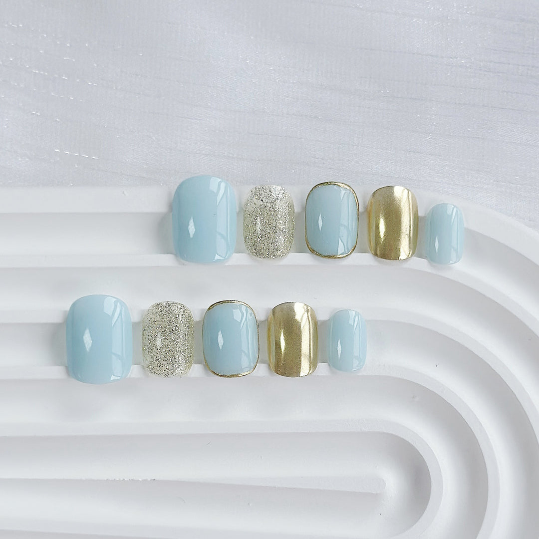Artistic Press-On Nail Set with Glitter and Metallic Accents