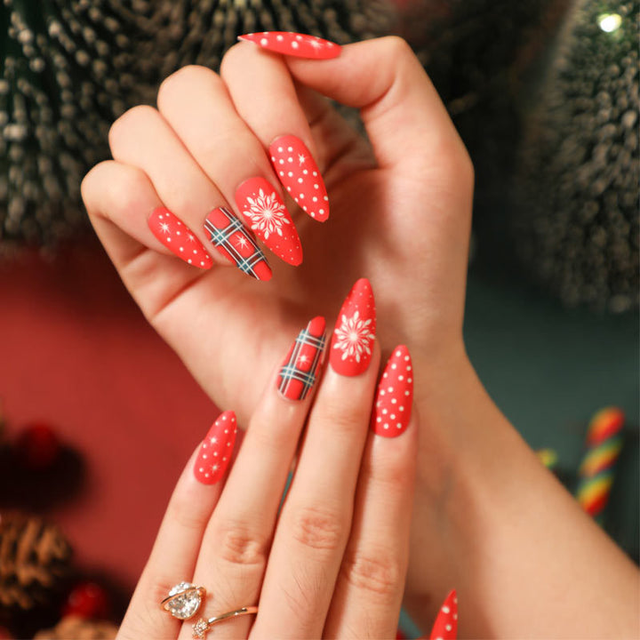 Artful stiletto nails with festive design Kalsten