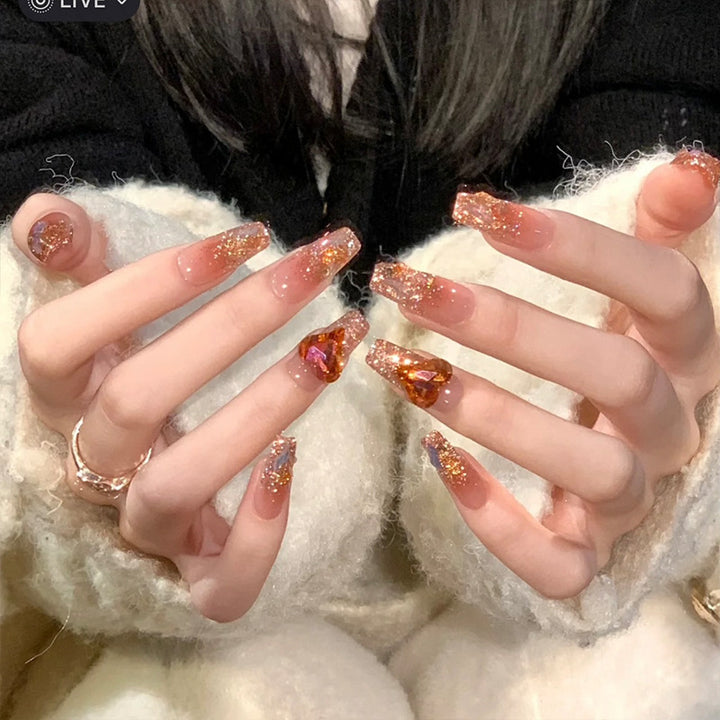 Artificial nail set with glitter and heart accents Kalsten