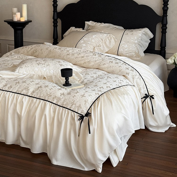 Jacquard bedding set with ruffle, decorative ribbons and fine piping
