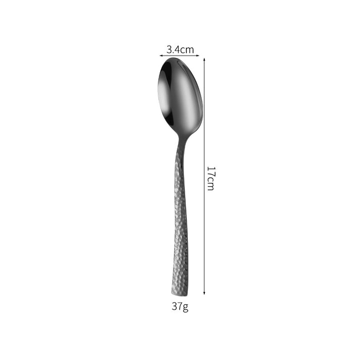 Elegant spoon with unique surface design Kalsten