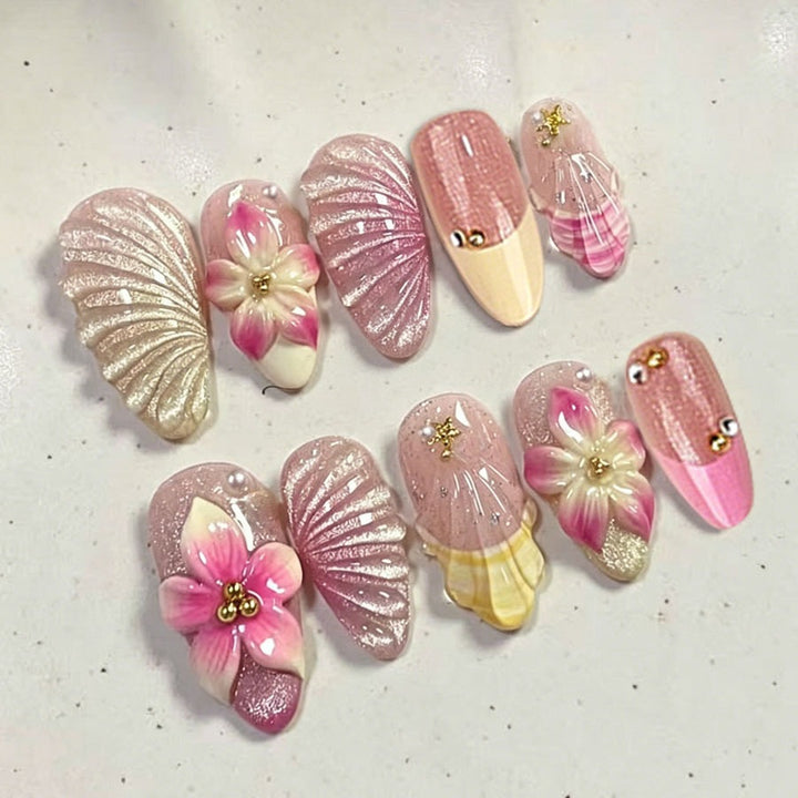 Artificial nail set with elaborate flower and shell patterns Kalsten