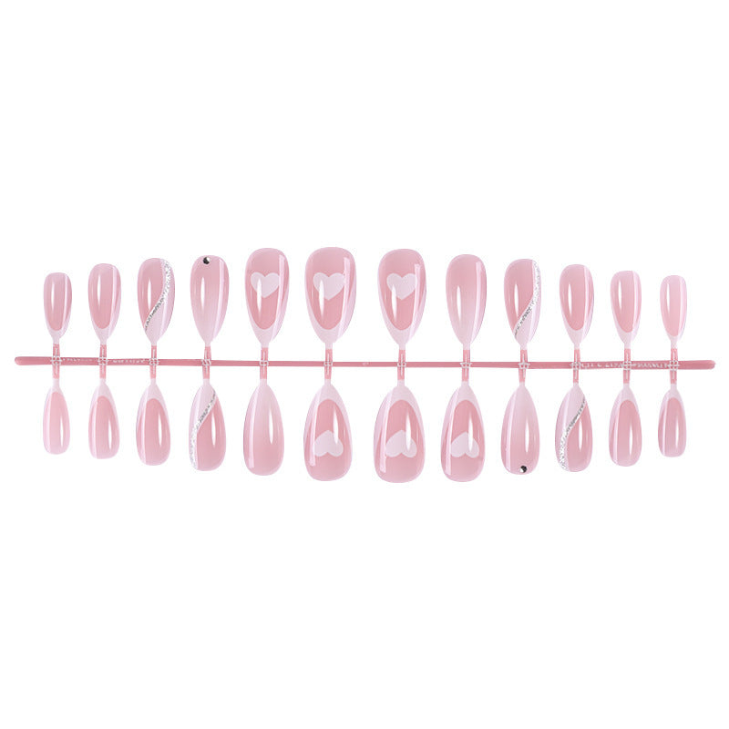 Acrylic nail set with romantic heart and glitter accents Kalsten