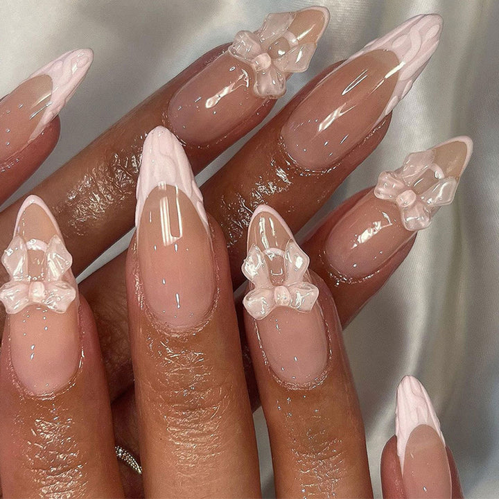Artistic Nail Extensions with Transparent Bow Accents Kalsten