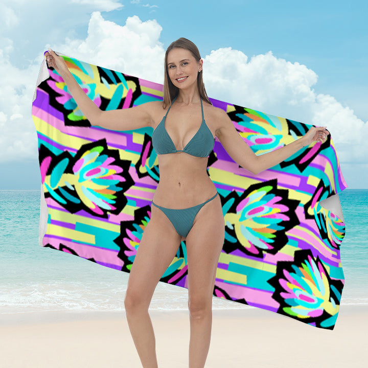 Beach towel with vibrant tropical plant motif Kalsten