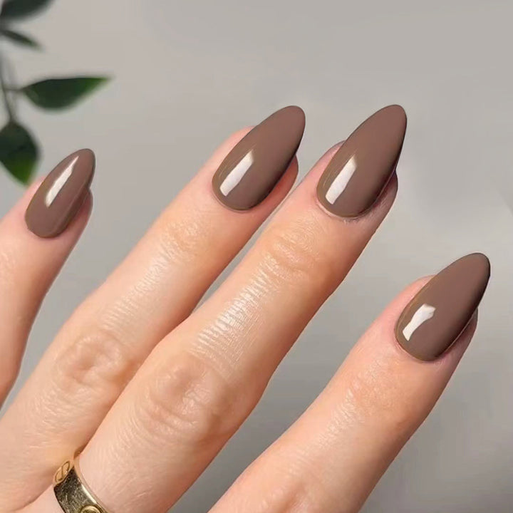 Artistic stiletto nails with elegant high-gloss finish Kalsten