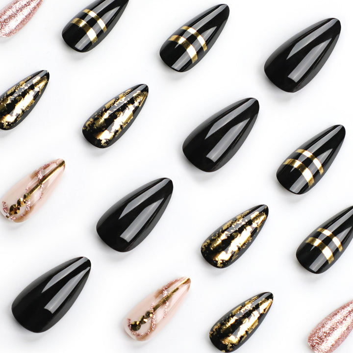 Glamorous stiletto nails with golden accents Kalsten