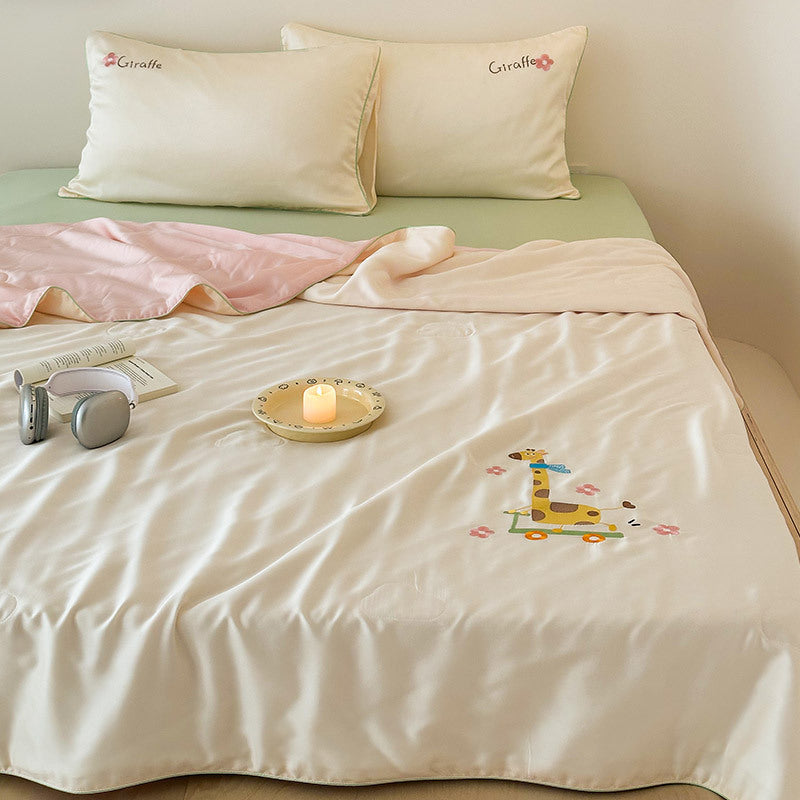 Children's satin bedding set with embroidered bunny moon and silky reversible throw