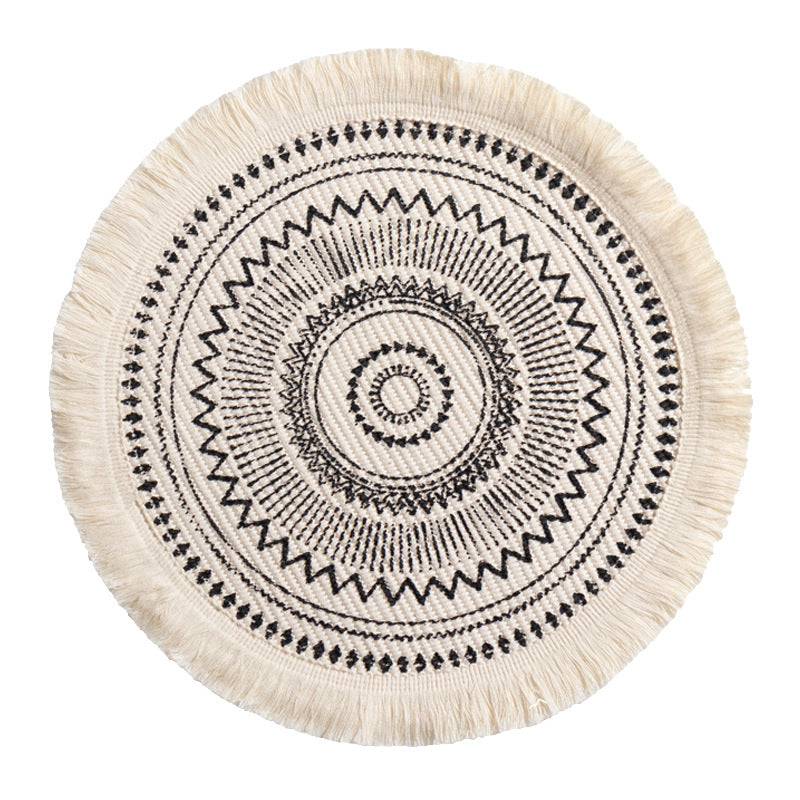 Round woven Boho rug mat with decorative fringes Kalsten