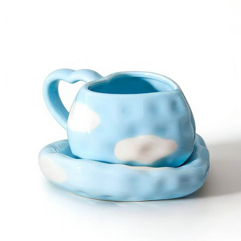 Heart-shaped ceramic cup set with saucer
