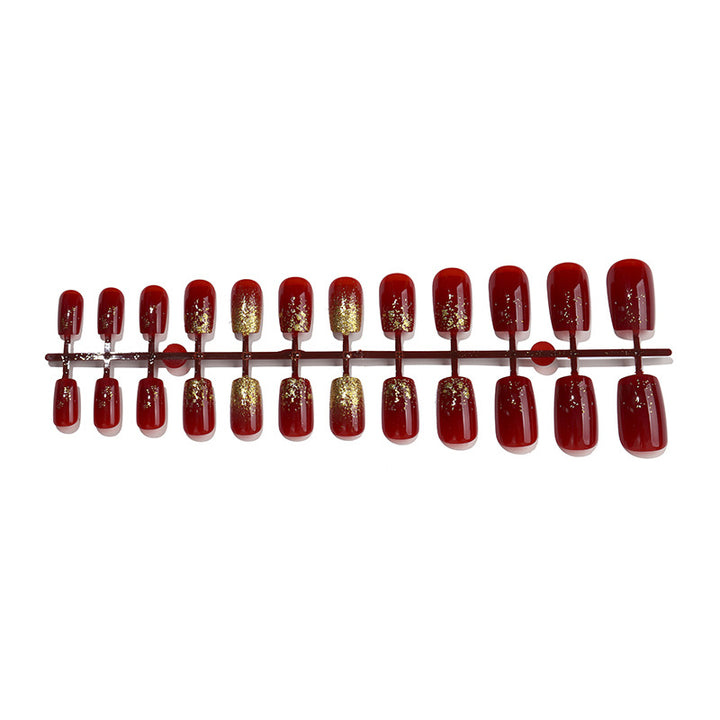 Elegant Press-On Nail Set with Glamorous Gold Glitter Accents Kalsten