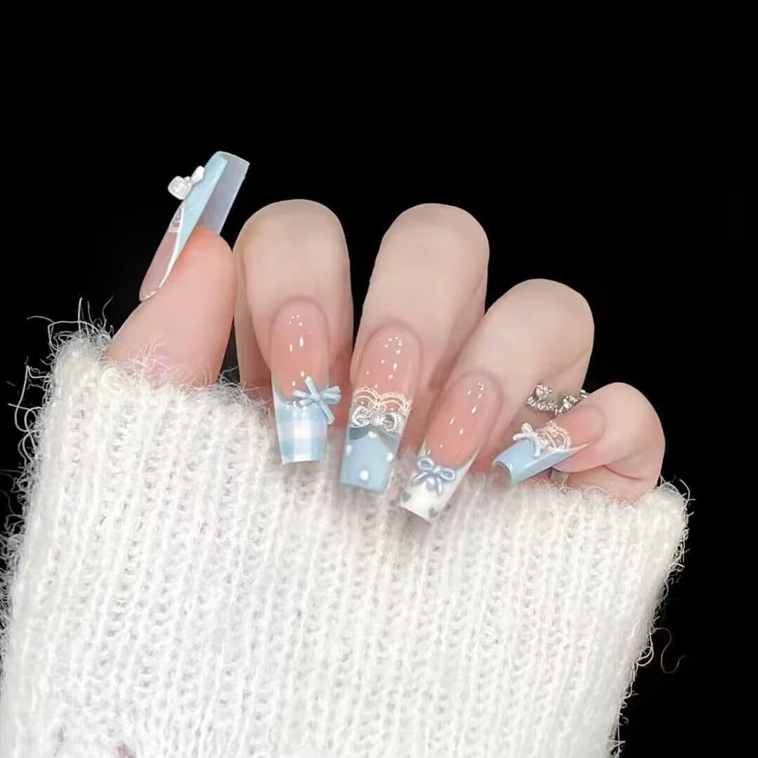 Elegant artificial nails with bow design Kalsten